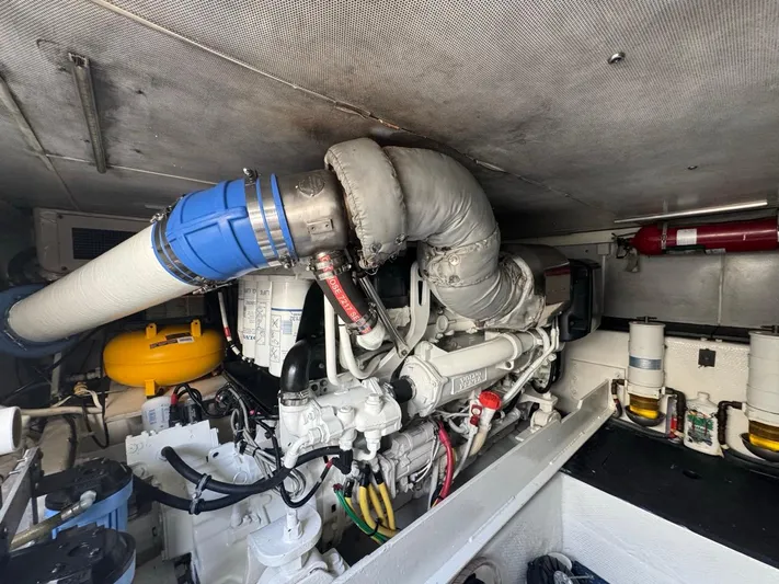  Yacht Photos Pics Engine room of 2009 Silverton 45 Convertible yacht, featuring detailed mechanical components.