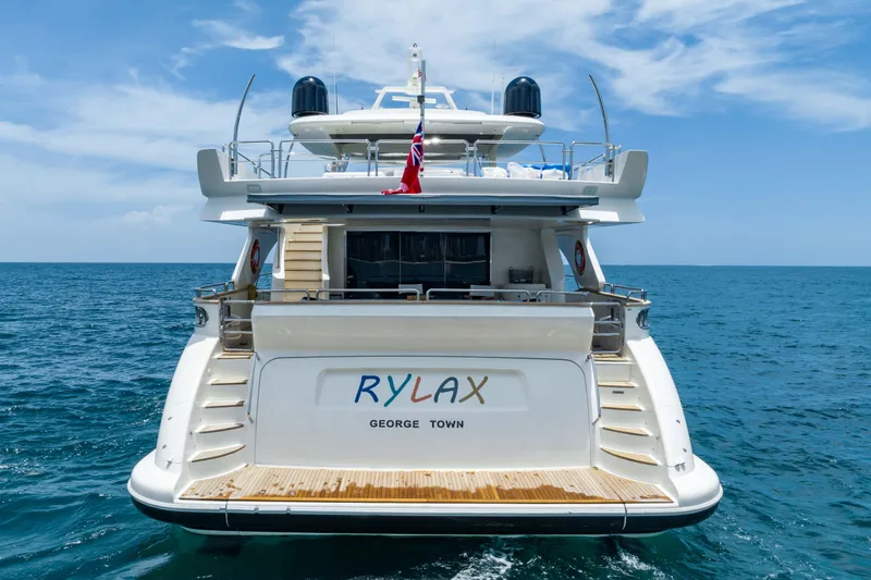  Yacht Photos Pics Azimut yacht from 2012 named "RYLAX" on open sea, rear view.