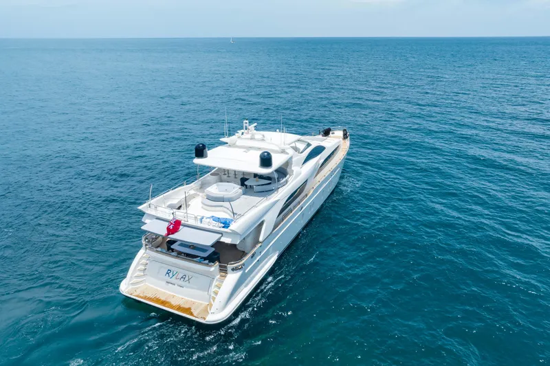  Yacht Photos Pics Luxurious 2012 Azimut yacht cruising on open sea, rear view.