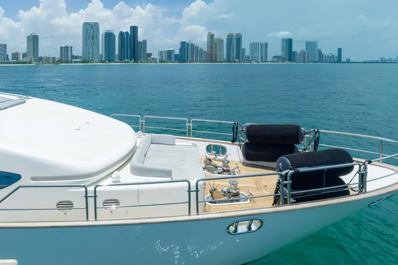 Yacht Photos Pics Luxury Azimut yacht on ocean with city skyline in background, 2012 model.