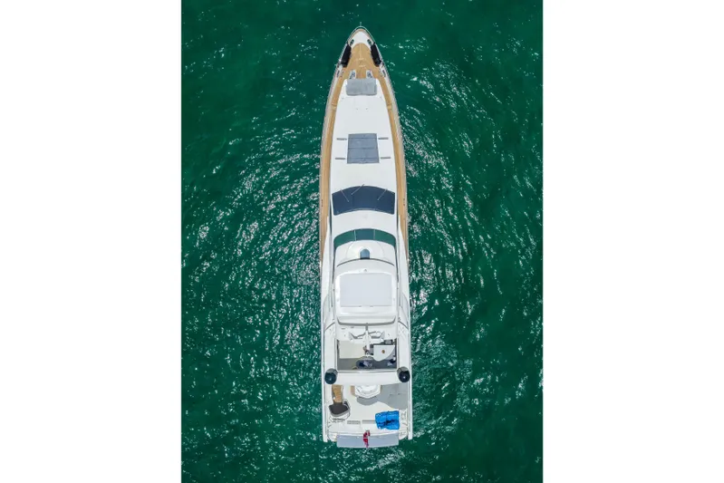  Yacht Photos Pics Aerial view of 2012 Azimut yacht on clear turquoise water.