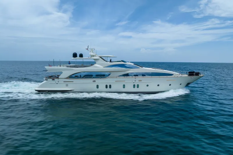  Yacht Photos Pics Luxurious 2012 Azimut yacht cruising on open sea under clear blue sky.