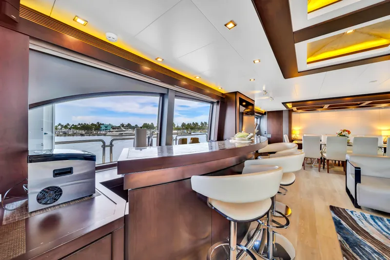  Yacht Photos Pics Luxurious 2012 Azimut yacht interior with modern bar, elegant seating, and scenic ocean view.