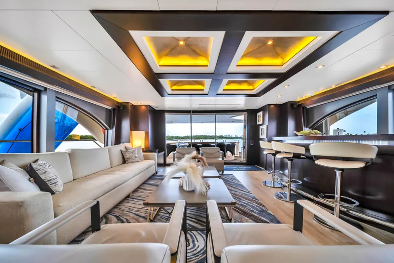  Yacht Photos Pics Luxurious interior of a 2012 Azimut yacht with modern furnishings and elegant lighting.