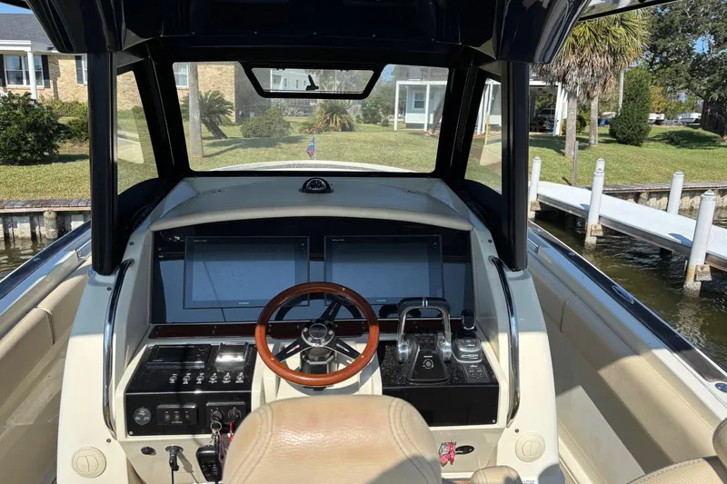  Yacht Photos Pics 2018 Chris-Craft 350 Catalina helm with modern controls and dual screens.