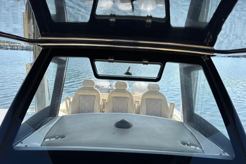  Yacht Photos Pics 2018 Chris-Craft 350 Catalina boat interior with luxurious seating and water view.
