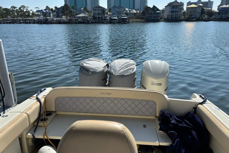  Yacht Photos Pics 2018 Chris-Craft 350 Catalina boat with twin engines on a calm waterfront.