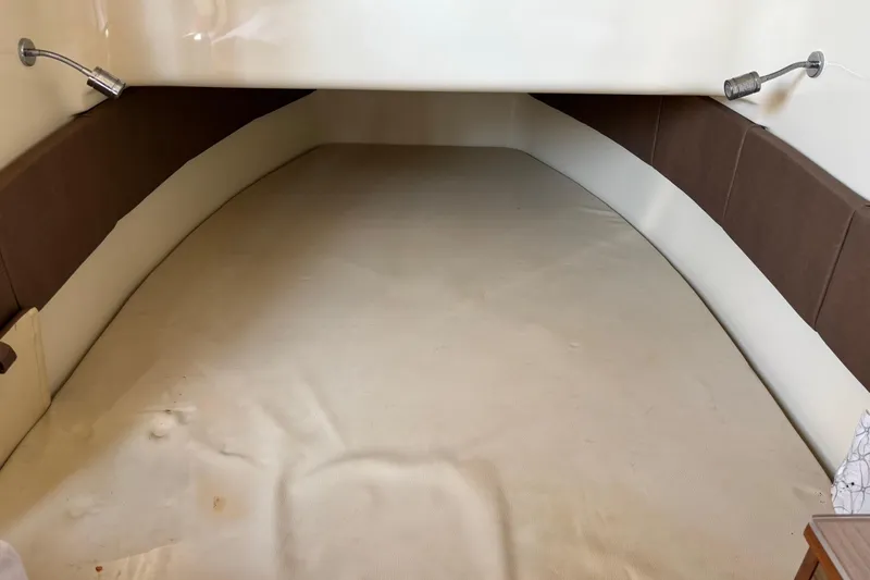  Yacht Photos Pics 2018 Chris-Craft 350 Catalina cabin interior with beige and brown upholstery.