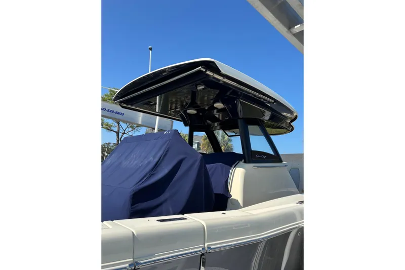  Yacht Photos Pics 2018 Chris-Craft 350 Catalina boat with covered seating, sleek design, and modern features.