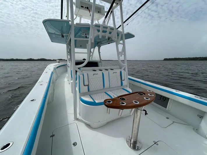 Blue Eyed Yacht Photos Pics 2016 Yellowfin 39 boat with blue accents on open water.