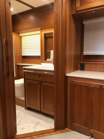Apricity Yacht Photos Pics Luxurious wood interior of 2021 Sabre 58 Salon Express yacht bathroom.