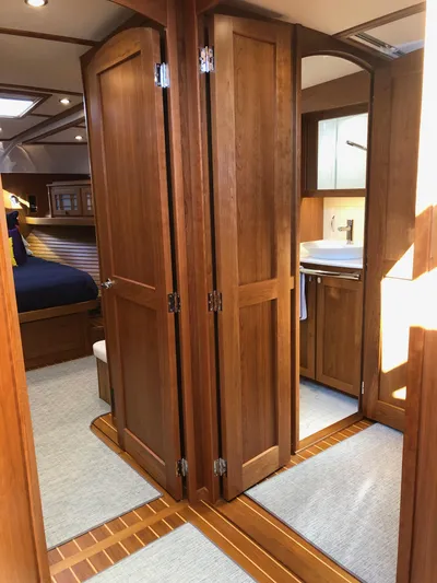 Apricity Yacht Photos Pics 2021 Sabre 58 Salon Express interior with wooden cabinetry and modern design.