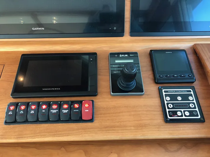 Apricity Yacht Photos Pics Control panel of 2021 Sabre 58 Salon Express with navigation and monitoring systems.