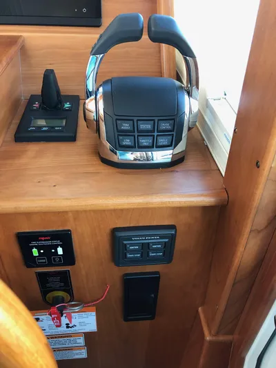 Apricity Yacht Photos Pics Control panel of 2021 Sabre 58 Salon Express yacht with throttle and switches.