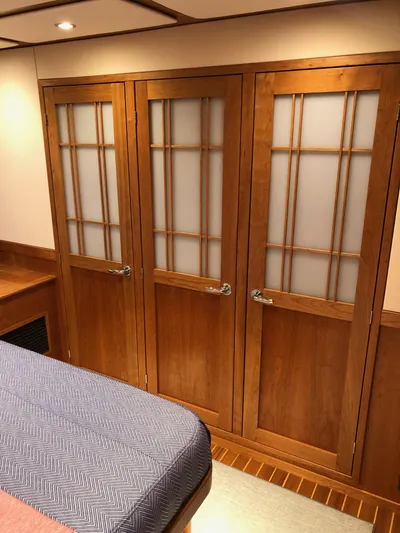 Apricity Yacht Photos Pics 2021 Sabre 58 Salon Express interior with wooden cabinets and modern design.