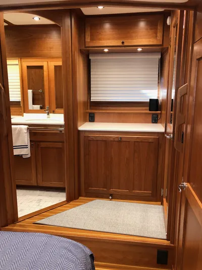 Apricity Yacht Photos Pics 2021 Sabre 58 Salon Express interior with wooden cabinetry and modern fixtures.