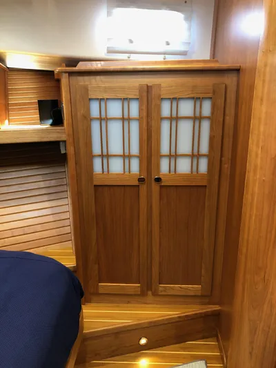 Apricity Yacht Photos Pics 2021 Sabre 58 Salon Express interior with wooden cabinetry and modern design.