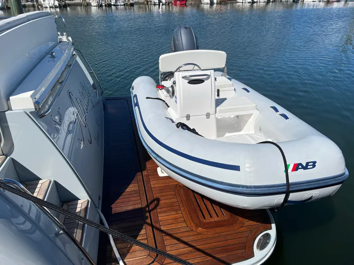 Apricity Yacht Photos Pics Inflatable boat docked on 2021 Sabre 58 Salon Express yacht.