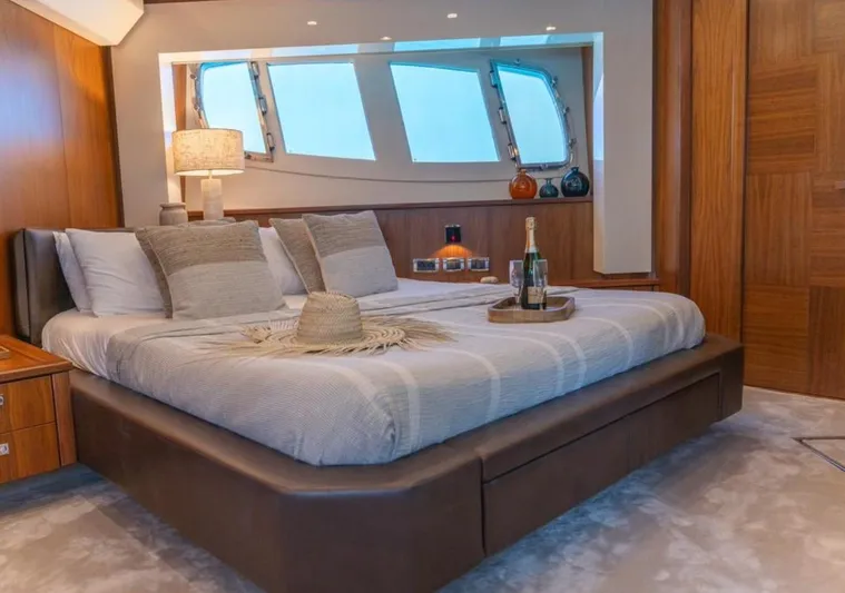 Nova Yacht Photos Pics Luxurious bedroom interior of 2008 Sunseeker Predator 92 yacht with elegant decor.