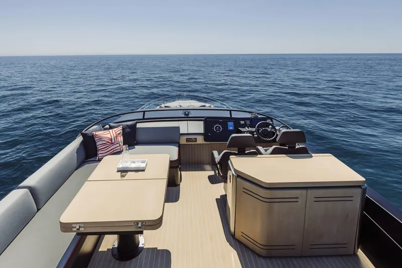  Yacht Photos Pics Luxurious 2026 Cranchi Sessantasette 67 Corsa yacht interior with ocean view.