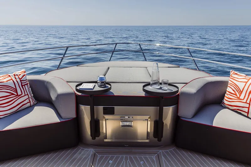  Yacht Photos Pics Luxurious 2026 Cranchi Sessantasette 67 Corsa yacht interior with ocean view and stylish seating.