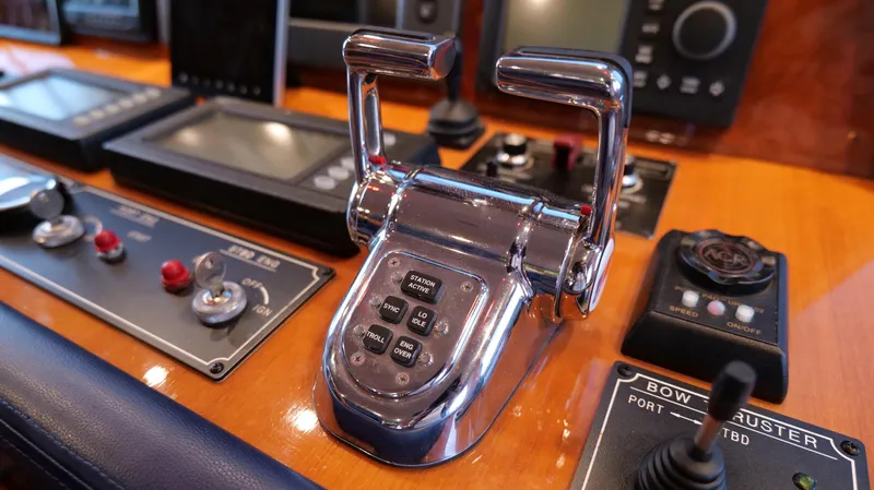  Yacht Photos Pics Control panel of a 2007 Jefferson Marquessa yacht with throttle and navigation instruments.