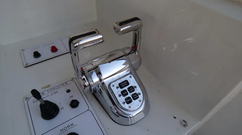  Yacht Photos Pics 2007 Jefferson Marquessa boat throttle controls and panel with switches.