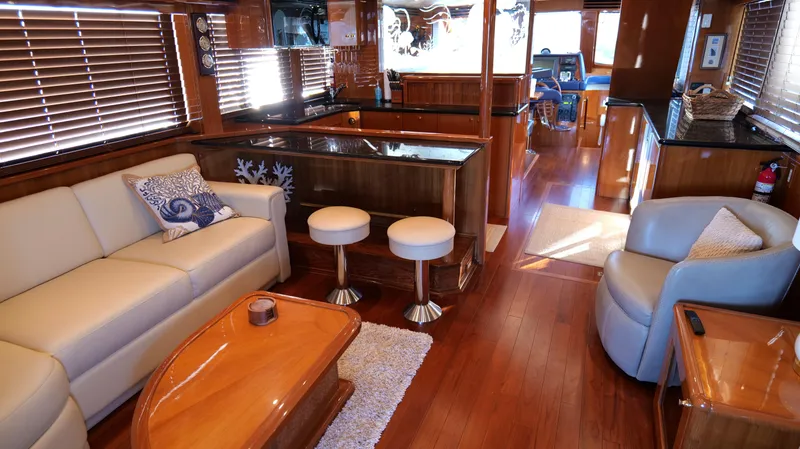  Yacht Photos Pics Luxurious 2007 Jefferson Marquessa yacht interior with elegant wood finishes and comfortable seating.