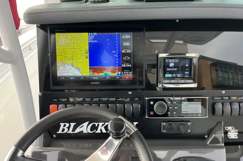  Yacht Photos Pics 2019 Blackfin 272 CC dashboard with Garmin navigation and control systems.