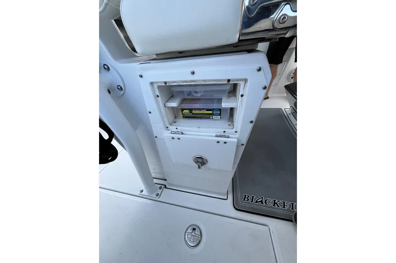  Yacht Photos Pics 2019 Blackfin 272 CC boat storage compartment with tackle box.