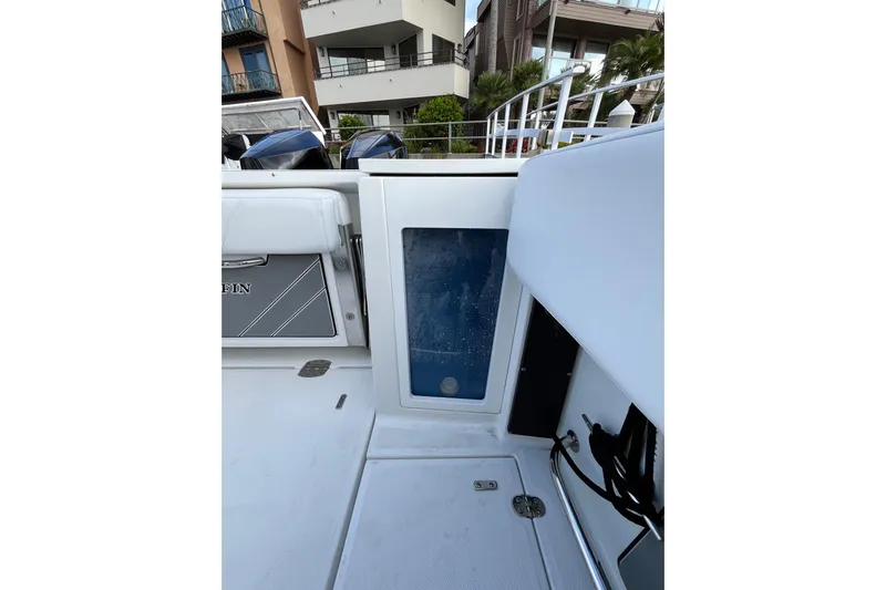  Yacht Photos Pics 2019 Blackfin 272 CC boat interior with seating and storage compartments.