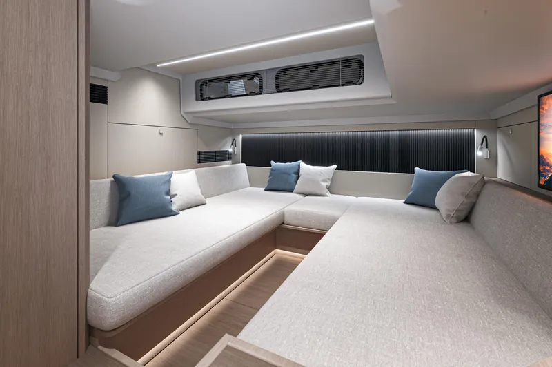  Yacht Photos Pics Luxurious interior of 2026 Beneteau Gran Turismo 40 yacht with modern seating and cushions.