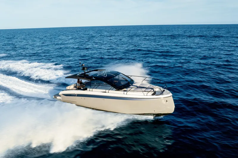 Yacht Photos Pics 2026 Beneteau Gran Turismo 40 cruising on open sea, showcasing sleek design and performance.