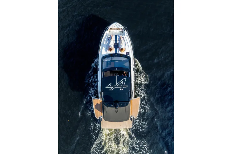  Yacht Photos Pics Aerial view of 2026 Beneteau Gran Turismo 40 yacht cruising on water.