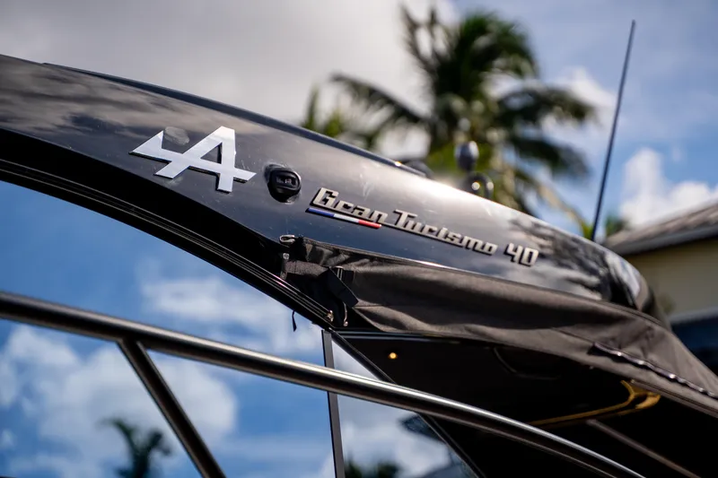  Yacht Photos Pics 2026 Beneteau Gran Turismo 40 yacht detail with palm trees in background.