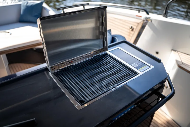  Yacht Photos Pics Outdoor grill on 2026 Beneteau Gran Turismo 40 yacht deck, ready for use.