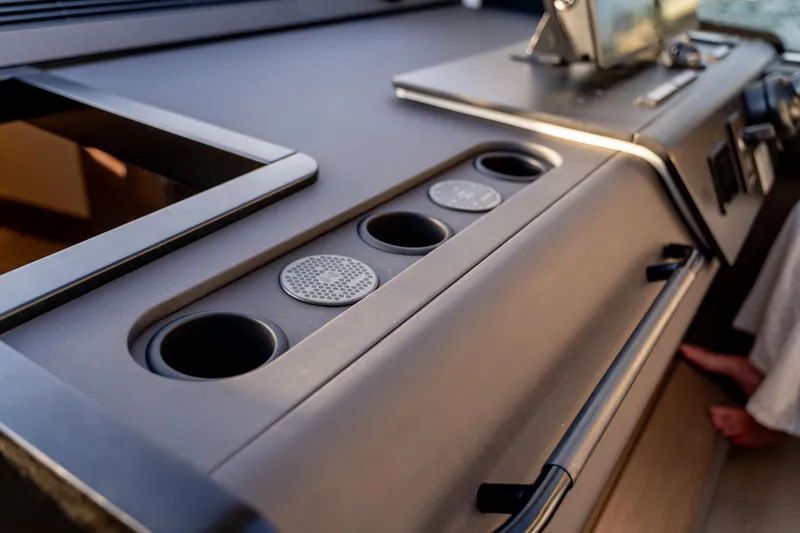  Yacht Photos Pics 2026 Beneteau Gran Turismo 40 yacht interior dashboard with modern controls and sleek design.