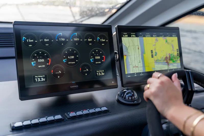  Yacht Photos Pics 2026 Beneteau Gran Turismo 40 dashboard with Garmin navigation and control screens.