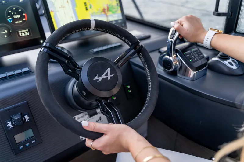  Yacht Photos Pics 2026 Beneteau Gran Turismo 40 helm with modern controls and navigation displays.