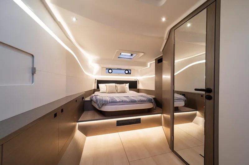  Yacht Photos Pics Luxurious interior of 2026 Beneteau Gran Turismo 40 yacht cabin with modern design.
