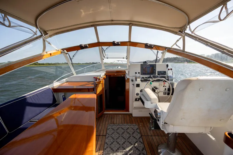  Yacht Photos Pics Interior of a 1998 Little Harbor WhisperJet 36 boat with helm and seating area.