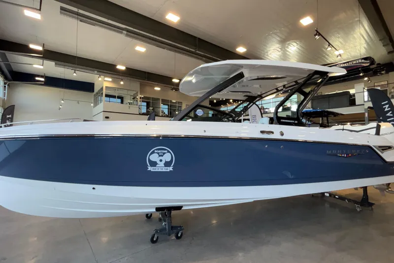  Yacht Photos Pics 2026 Monterey Elite 30 OB boat displayed indoors, featuring sleek design and modern amenities.