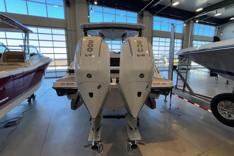  Yacht Photos Pics 2026 Monterey Elite 30 OB boat with dual 300 V8 engines in showroom.