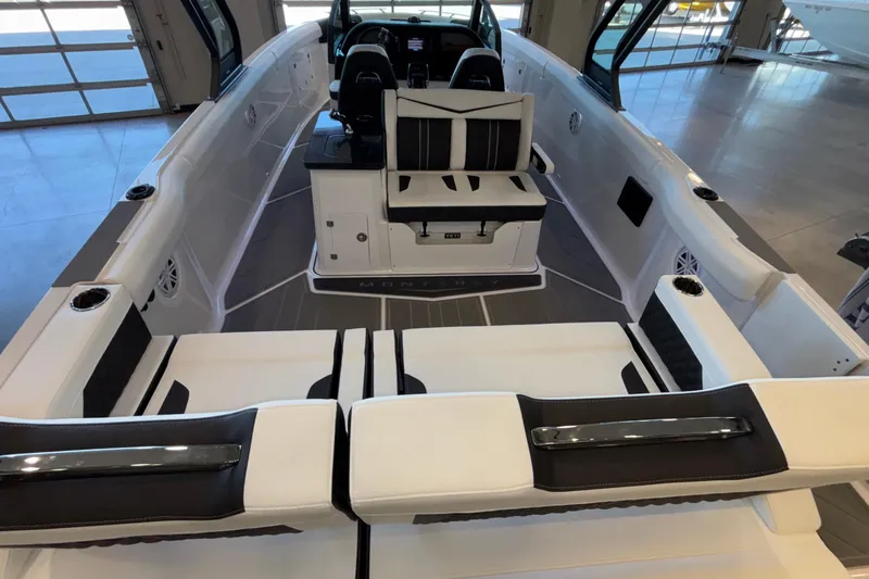  Yacht Photos Pics 2026 Monterey Elite 30 OB boat interior with sleek seating and modern design.