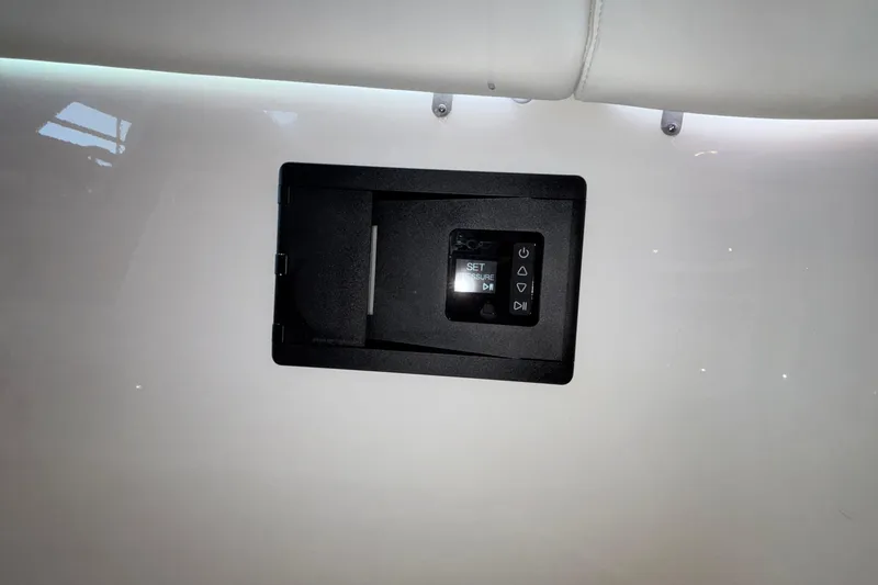  Yacht Photos Pics Control panel on 2026 Monterey Elite 30 OB boat interior.