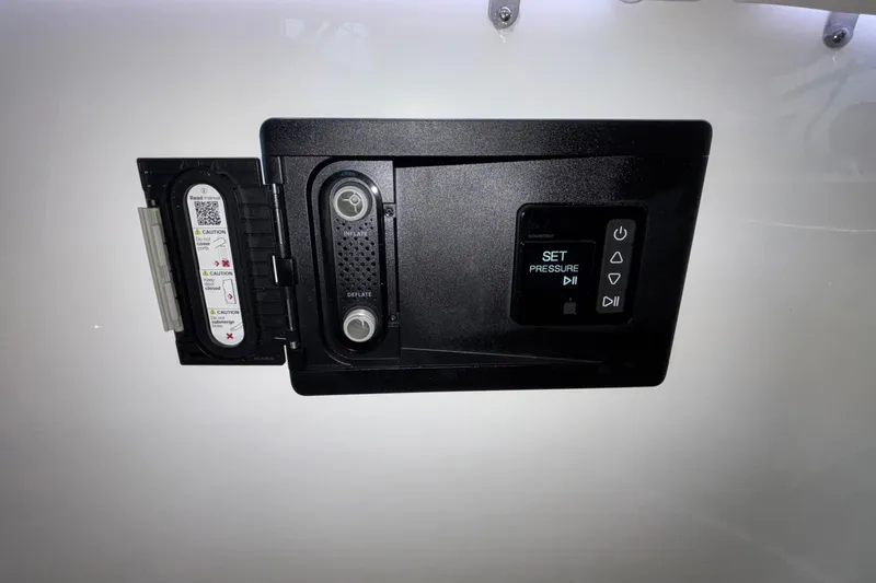  Yacht Photos Pics Control panel of 2026 Monterey Elite 30 OB boat with pressure settings and caution labels.