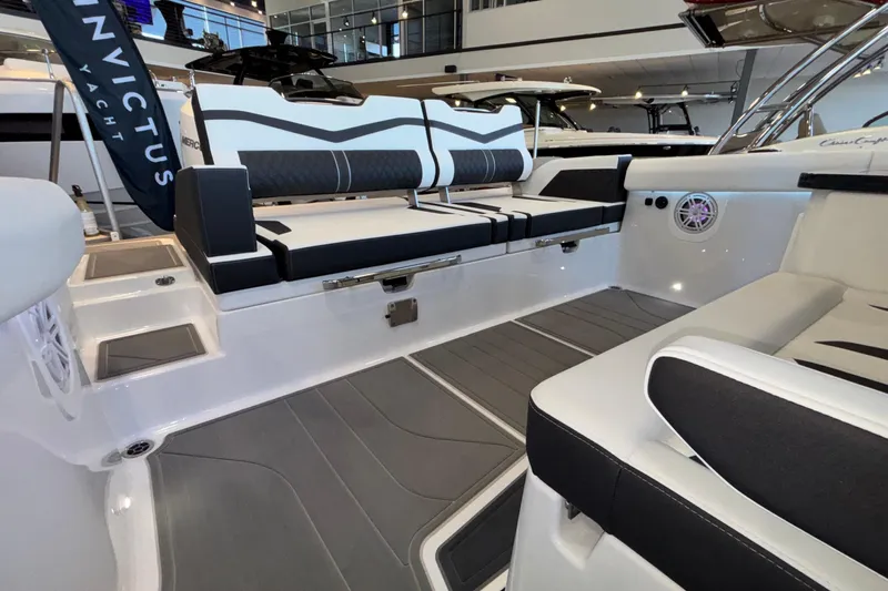  Yacht Photos Pics 2026 Monterey Elite 30 OB boat interior with sleek seating and modern design.