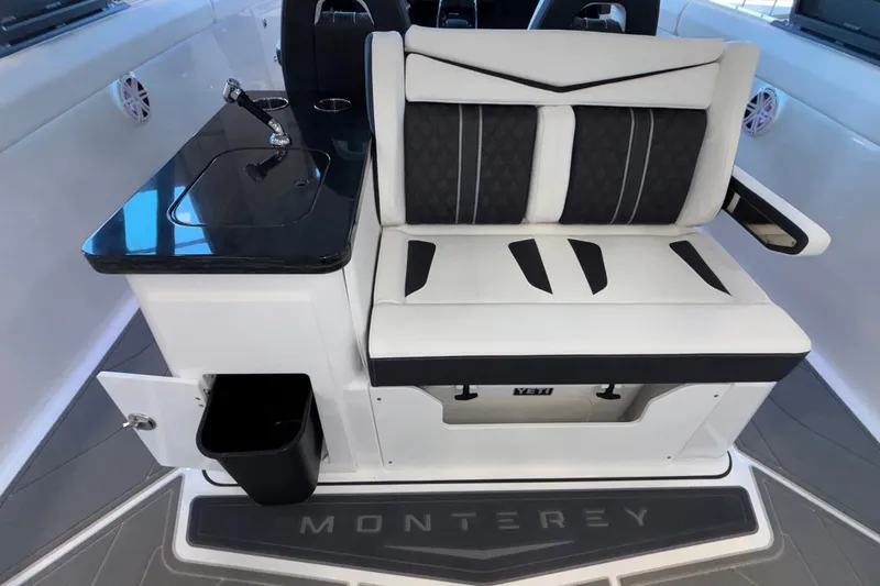  Yacht Photos Pics 2026 Monterey Elite 30 OB boat interior with sleek seating and modern design.