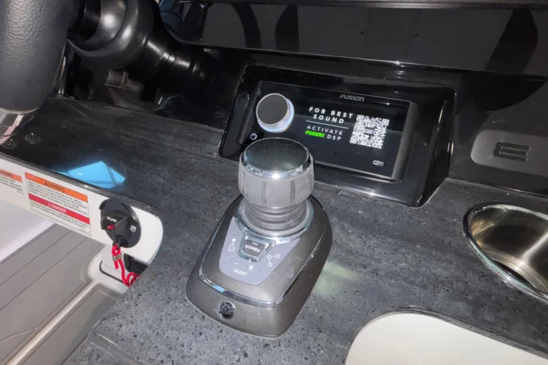  Yacht Photos Pics Control panel of 2026 Monterey Elite 30 OB boat with joystick and display screen.