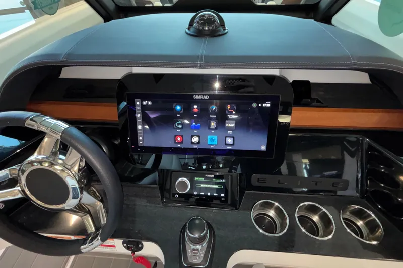  Yacht Photos Pics Dashboard of 2026 Monterey Elite 30 OB boat with touchscreen and steering wheel.